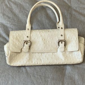 Italian leather. Only worn once great bag for summer and spring